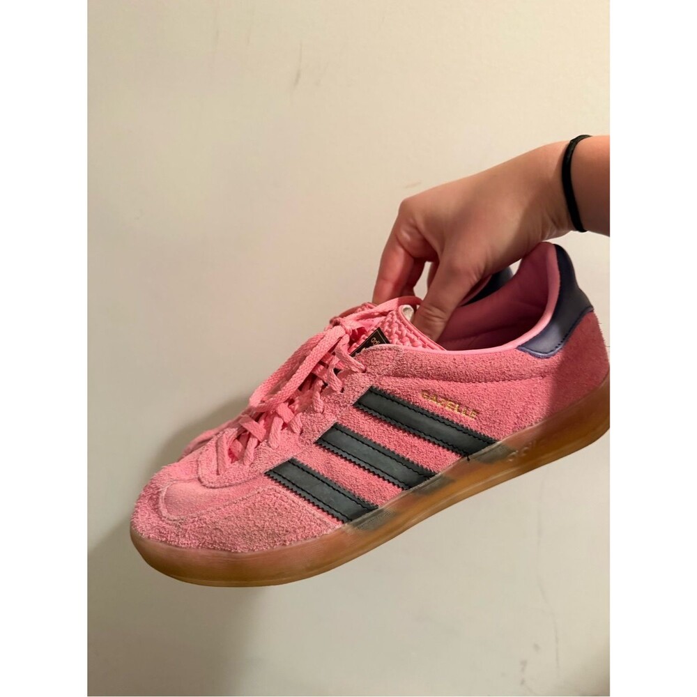 adidas pink suede sneakers with black stripes and gum sole